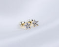 14k gold plated oorknopjes met zirkonia stenen in de vorm van een bloem