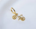 Handgemaakte 14k gold plated oorbel met een hanger in de vorm van een fiets 