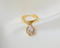 Handgemaakte 14k gold plated oorbel met ingelegde zirkonia en een druppel hanger van witte zirkonia