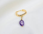 Handgemaakte 14k gold plated oorbel met ingelegde zirkonia en een amethist hanger