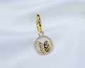 Handgemaakte 14k gold plated oorbel met ronde vlinder hanger en pavé zirkonia