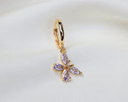 Handgemaakte 14k gold plated oorbel met vlinder hanger van lila zirkonia