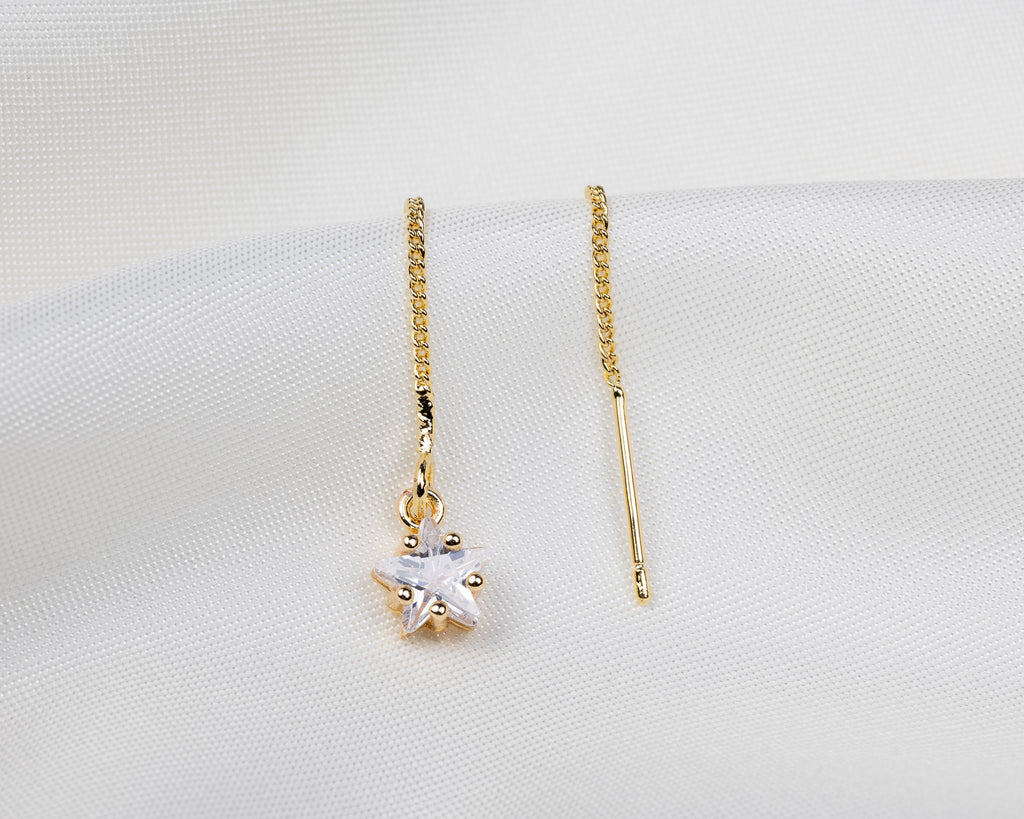 Handgemaakte 14k gold plated trekoorbel met geboortesteen van de maand april in de vorm van een ster