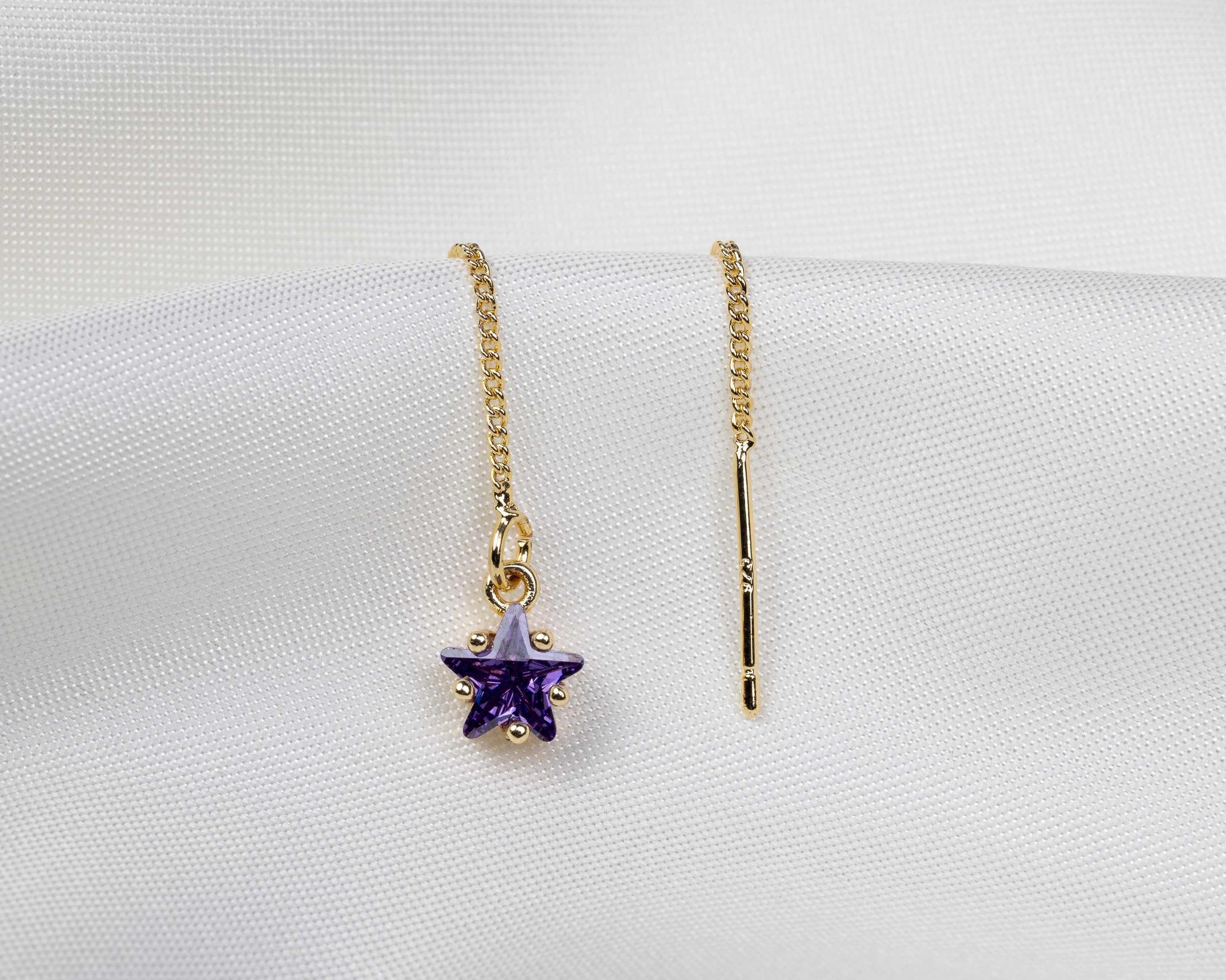 Handgemaakte 14k gold plated trekoorbel met geboortesteen van de maand februari in de vorm van een ster