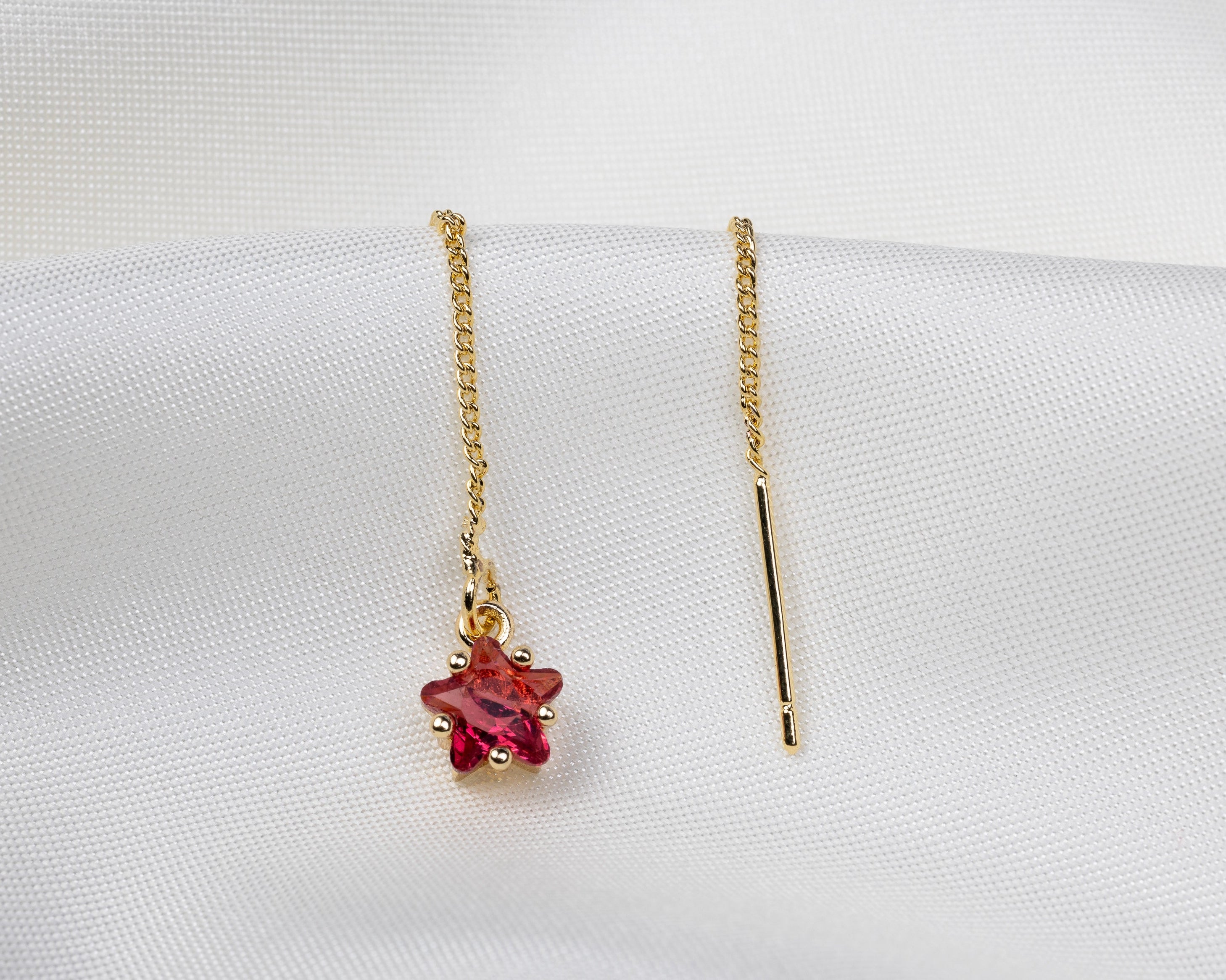 Handgemaakte 14k gold plated trekoorbel met geboortesteen van de maand juli in de vorm van een ster