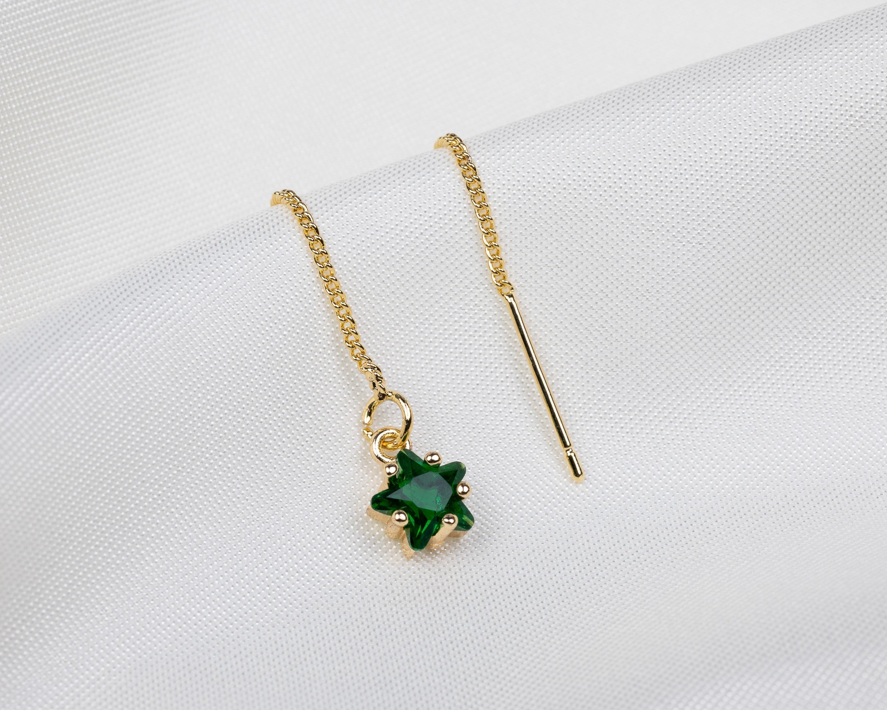 Handgemaakte 14k gold plated trekoorbel met geboortesteen van de maand mei in de vorm van een ster