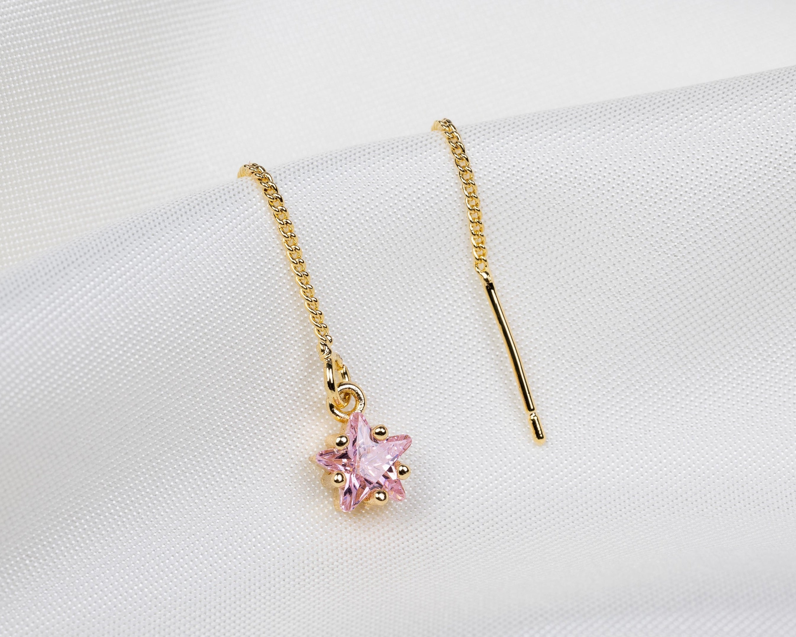 Handgemaakte 14k gold plated trekoorbel met de geboortesteen van de maand oktober in de vorm van een ster