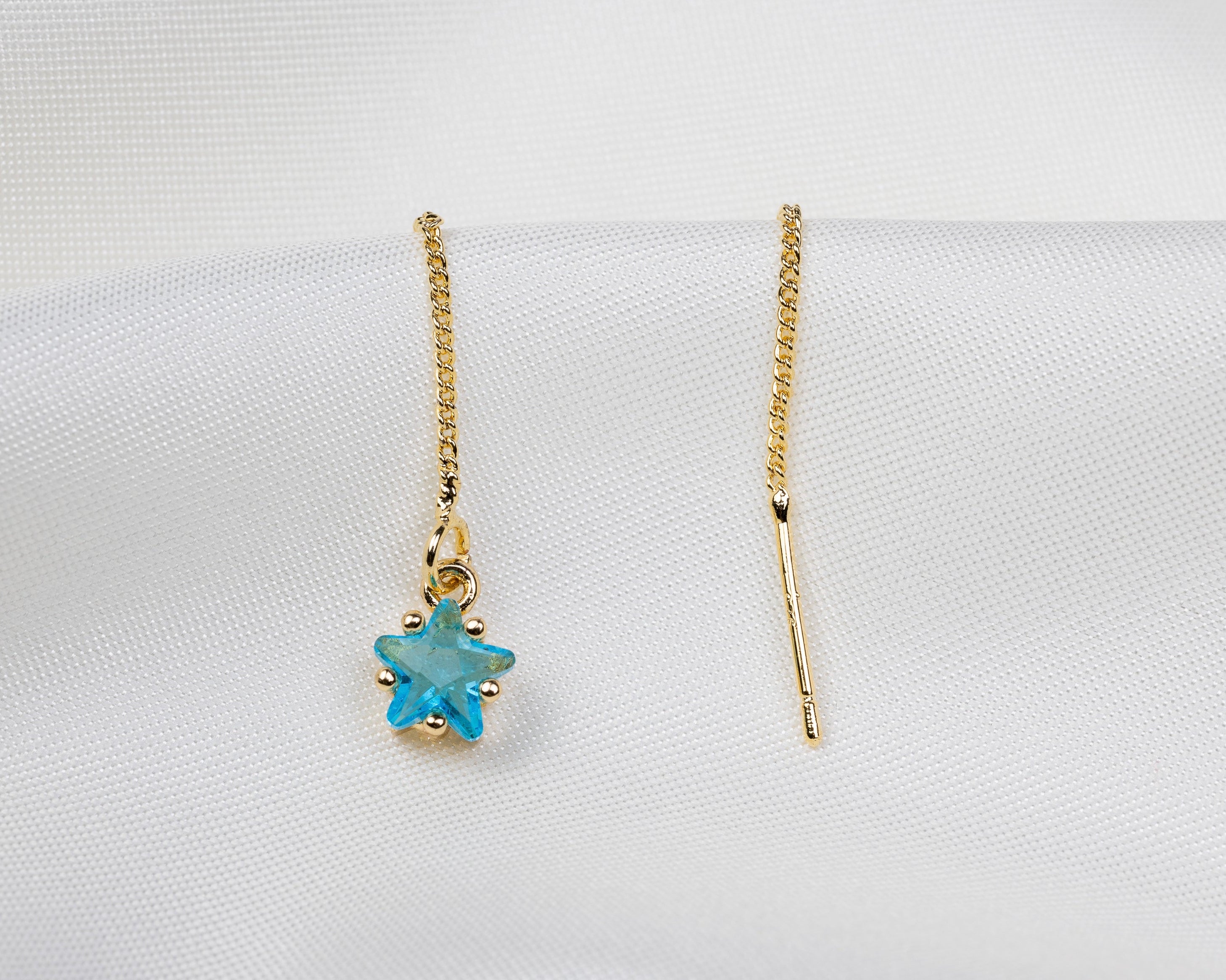 Handgemaakte 14k gold plated trekoorbel met geboortesteen van de maand maart in de vorm van een ster